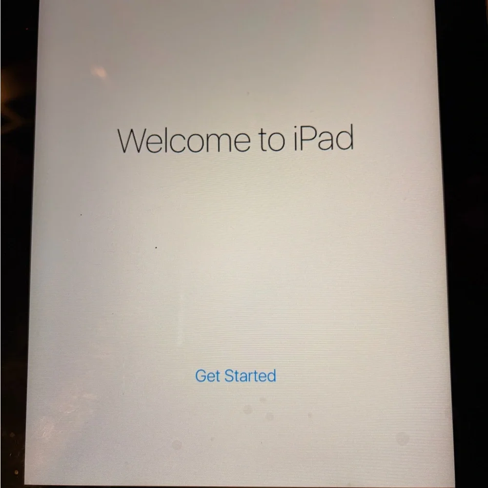 iPad 2 - Silver with Black Frame. Pre owned in good condition. Good for kids